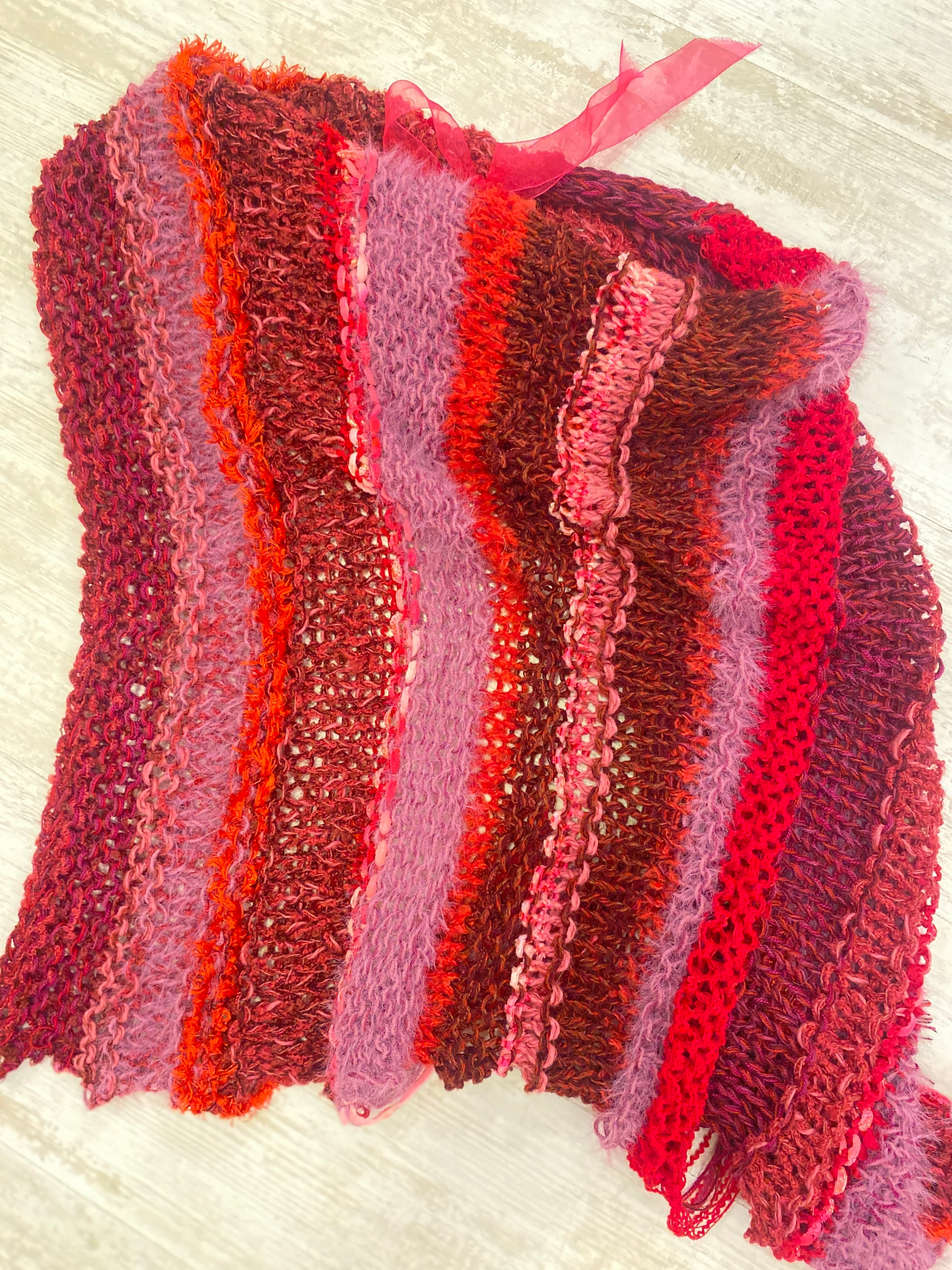 PONCHO ROJOS-FUCSIAS TEJIDOS DE KARLA